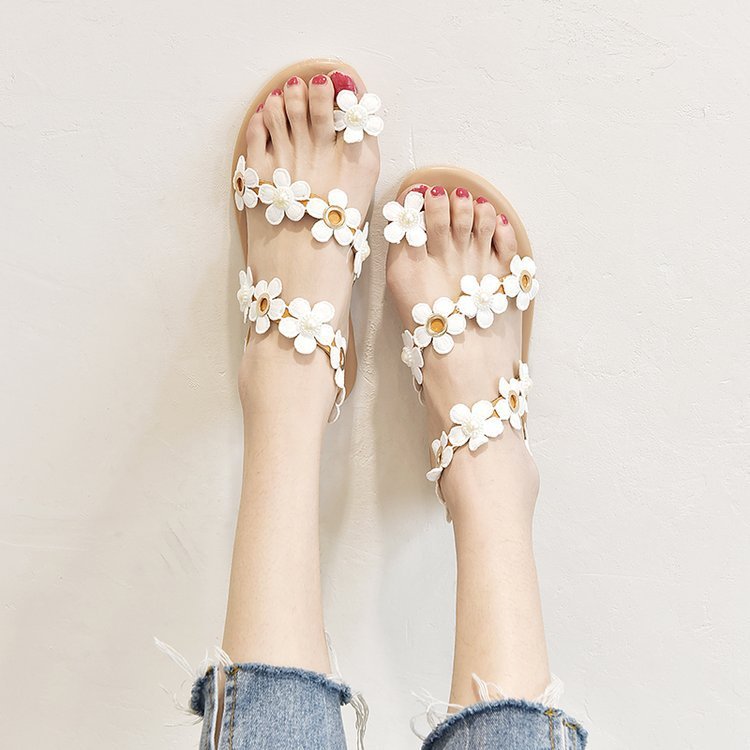 Flower sandals women's flat shoes summer new wild Korean version of the Roman women's shoes fairy wind ins tide